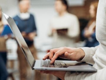 man-working-laptop-while-standing